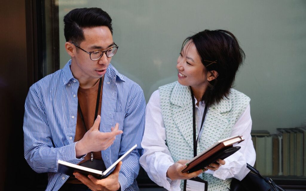 Asian man and woman talking